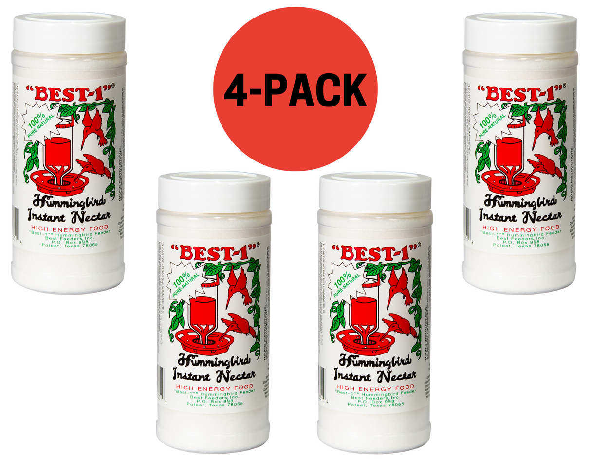 Product shot showing a four-pack of Best-1 Hummingbird Instant Nectar containers featuring vibrant red hummingbird feeders and green foliage against a white background, showcasing 100% pure natural ingredients and a prominent red 4-pack label.