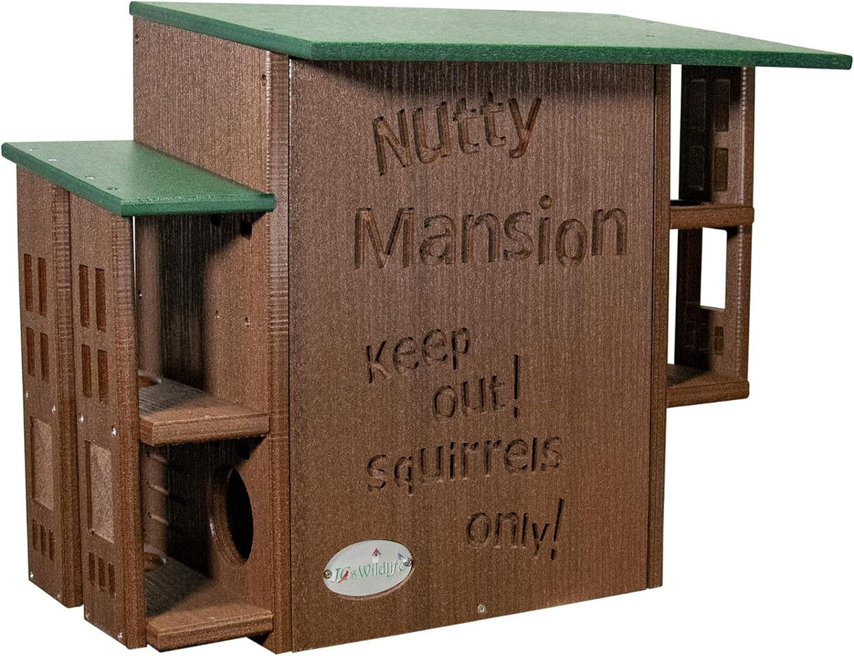 JCs Wildlife Nutty Mansion squirrel feeder features a brown and green multi-level design with cut-out windows and the words Keep out squirrels only carved into the side.