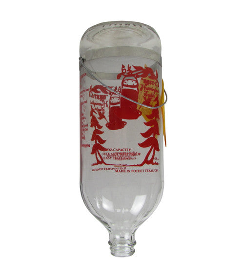 Glass hummingbird feeder from Poteet Texas featuring red stylized hummingbirds and trees a wire hanger and yellow tag