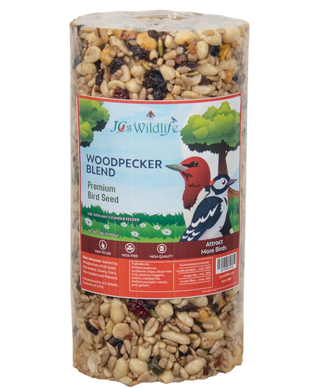 JC's Wildlife Woodpecker Blend premium bird seed in a clear cylinder, featuring a red-bellied woodpecker and a variety of nuts, seeds, cranberries, and raisins against a green tree background
