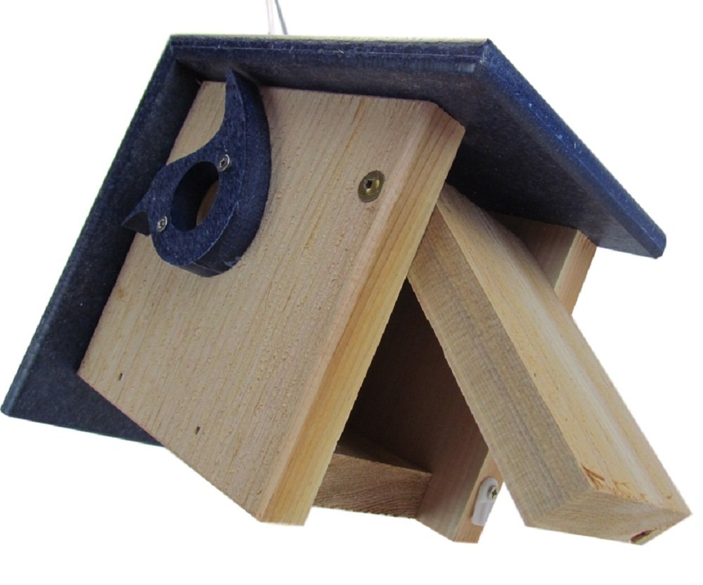 Wood birdhouse with a dark blue roof and a unique crescent-shaped entrance featuring light wood grain and visible screws.
