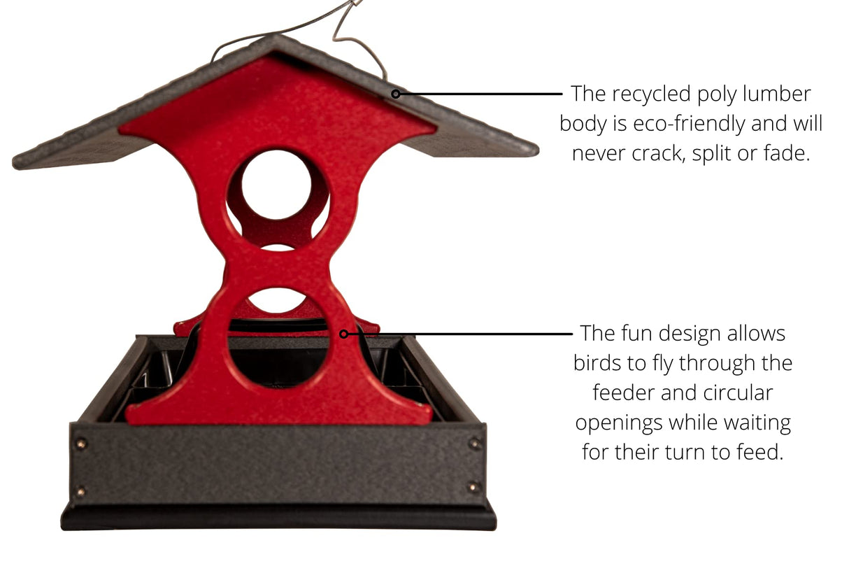 Recycled poly lumber bird feeder featuring a red body, gray base, and a dark gray roof showcasing circular openings for birds to fly through.
