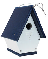 Recycled plastic birdhouse with a navy blue roof and white body featuring ventilation slots and a hanging wire
