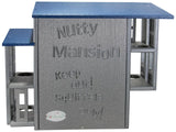 JCs Wildlife Nutty Mansion squirrel feeder features a gray and blue design with multiple feeding platforms and the words Keep Out Squirrels Only carved into the side.
