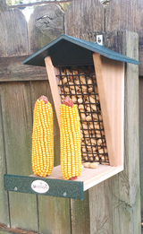 JCS Wildlife Double Snacker Squirrel Feeder with corn and peanuts, featuring a recycled poly lumber design.
