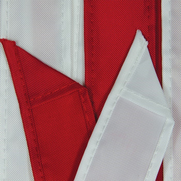 Close-up of In The Breeze U.S. Stars and Stripes Embroidered 60" Windsock showcasing red and white fabric detail.