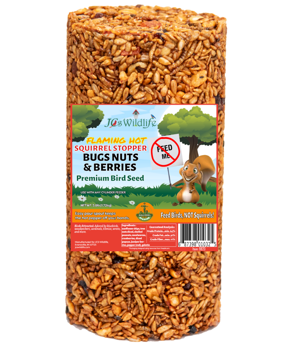 JCS Wildlife Flaming Hot Squirrel Stopper Bugs Nuts & Berries Premium Bird Seed shows a cylindrical package of birdseed containing sunflower seeds, berries, and mealworms against a white background
