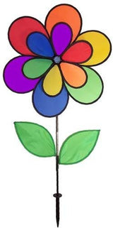 Colorful nylon garden spinner depicting a vibrant rainbow flower with black outlines and two bright green leaves on a black stake
