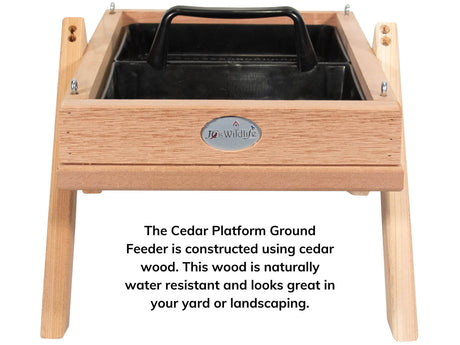 JCS Wildlife Cedar Platform Ground Feeder Large features a removable tray made of durable cedar wood.